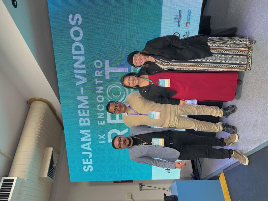 The panelists posing for a photo together at the event